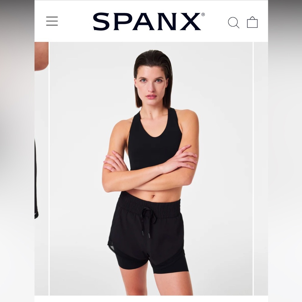 Spanx 2 in 1 running shorts, size small, black.